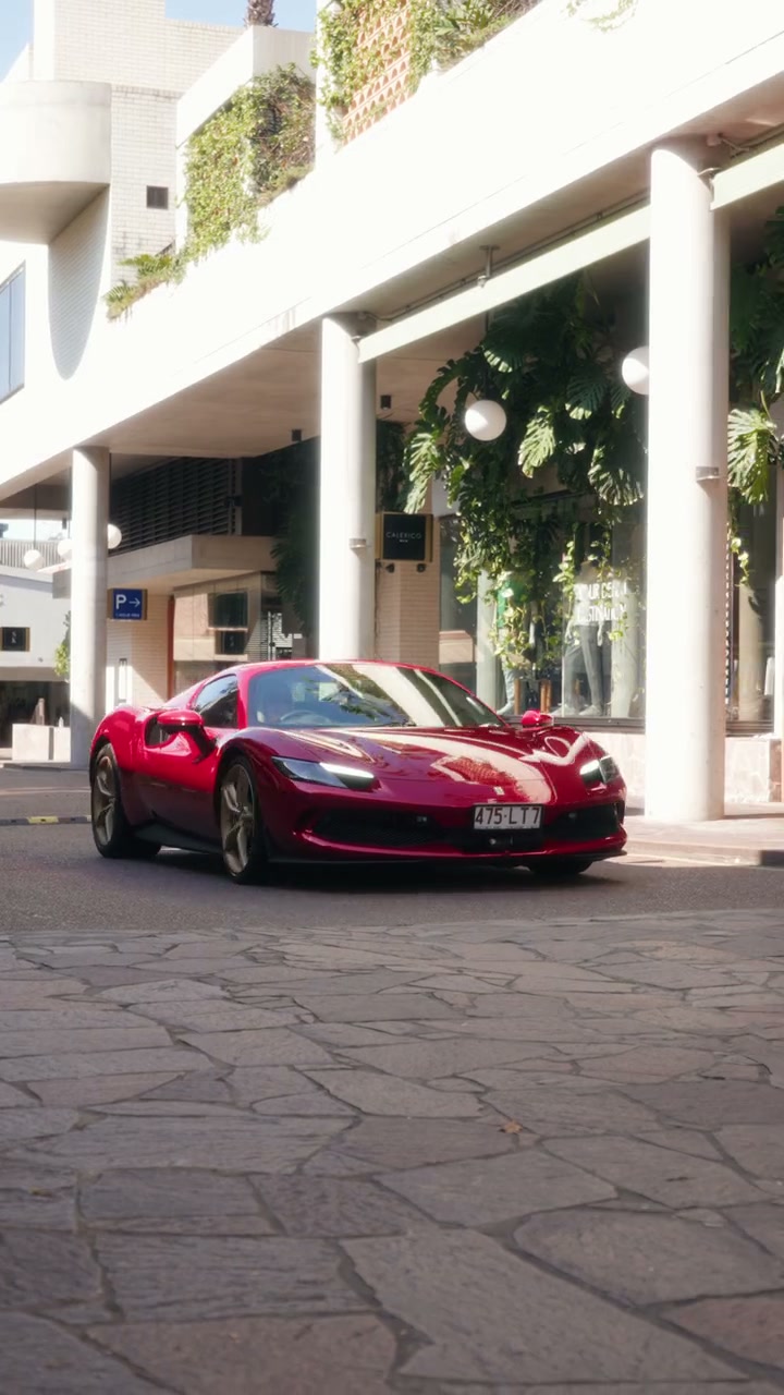 Red sports car in the Hamilton campaign for Ray White and The Sunset Run